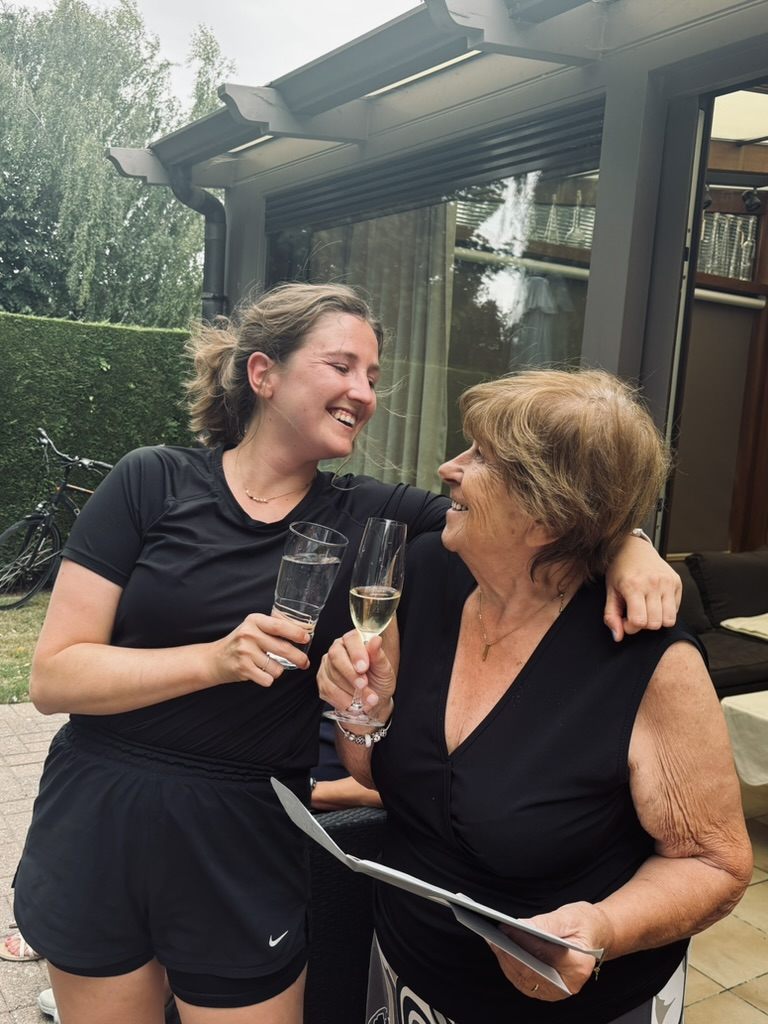 Emma toasting with her grandmother